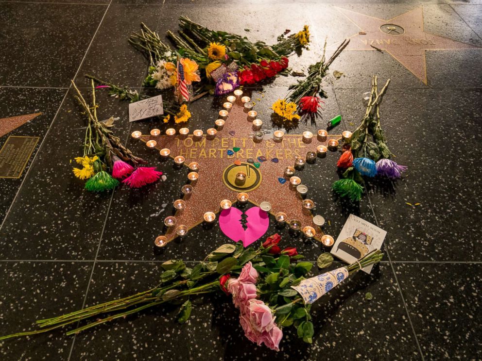 PHOTO: Fans leave flowers on Tom Pettys star on the Hollywood Walk of Fame after the announcement of his death, Oct. 2, 2017, in Los Angeles.