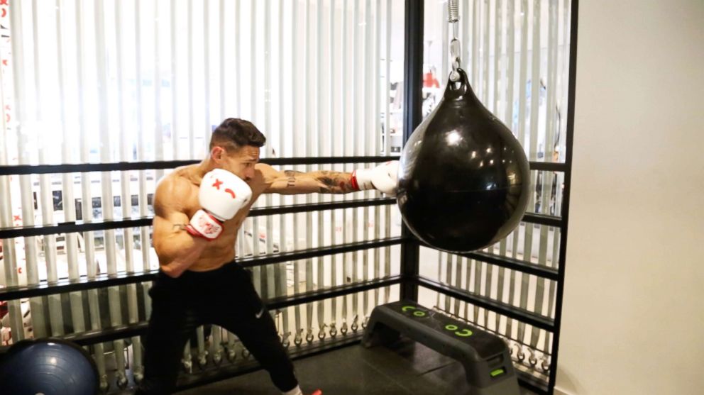 PHOTO: Noah Neiman demonstrates a boxing move at New York City's Rumble Boxing Studio.