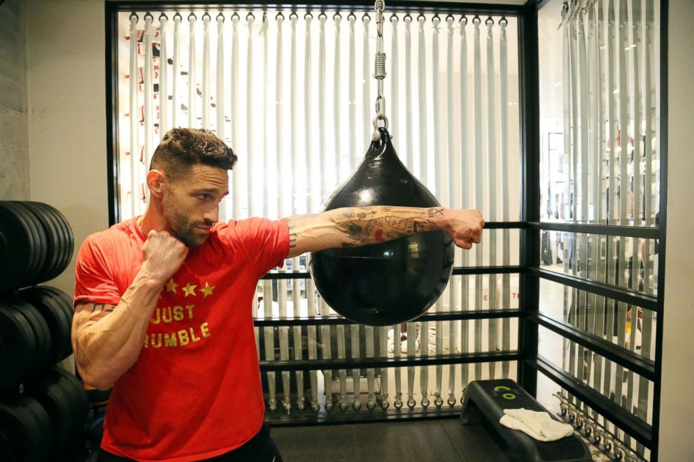 PHOTO: Noah Neiman demonstrates a move at New York City's Rumble Boxing Studio.