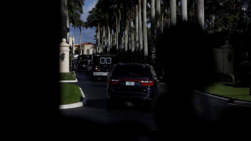 The motorcade of U.S. President Donald Trump arrives at Trump International Golf Club in West Palm Beach, Fla., Feb. 19, 2018.
