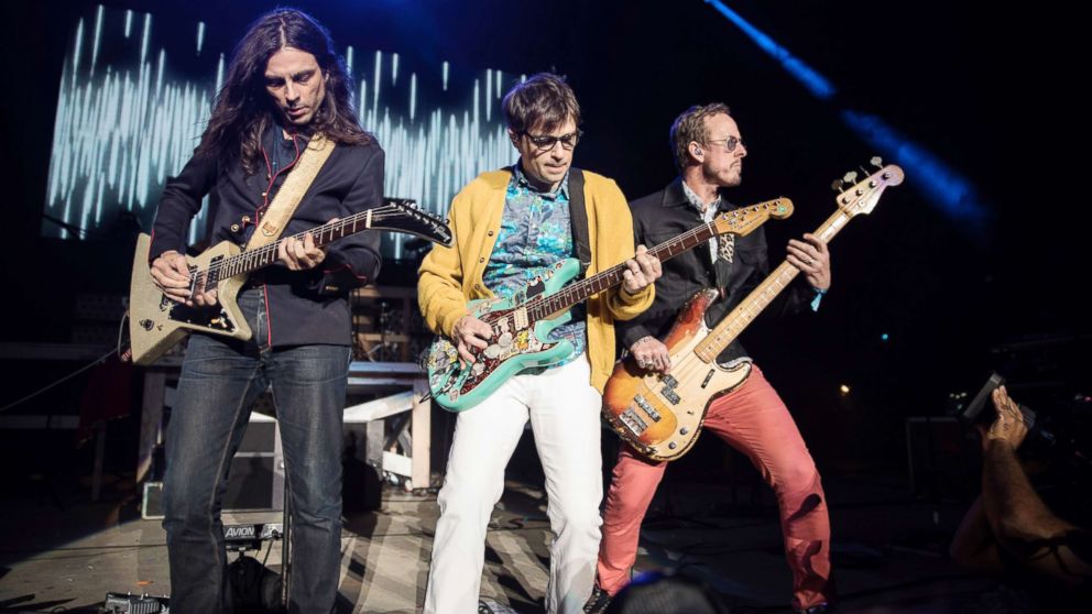 Guitarist Brian Bell, vocalist Rivers Cuomo and bassist Scott Shriner of Weezer perform at ID10T festival on June 24, 2017, in Mountain View, Calif.