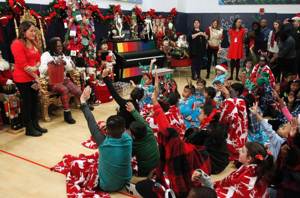 PHOTO: Whoopi Goldberg teamed up with Disney's "Share the Joy" campaign and the nonprofit One Simple Wish to throw a holiday part for nearly 50 foster children at Mott Haven Academy in the Bronx. 