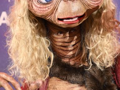 Heidi Klum and Janelle Monáe wear elaborate E.T. costumes for their Halloween parties