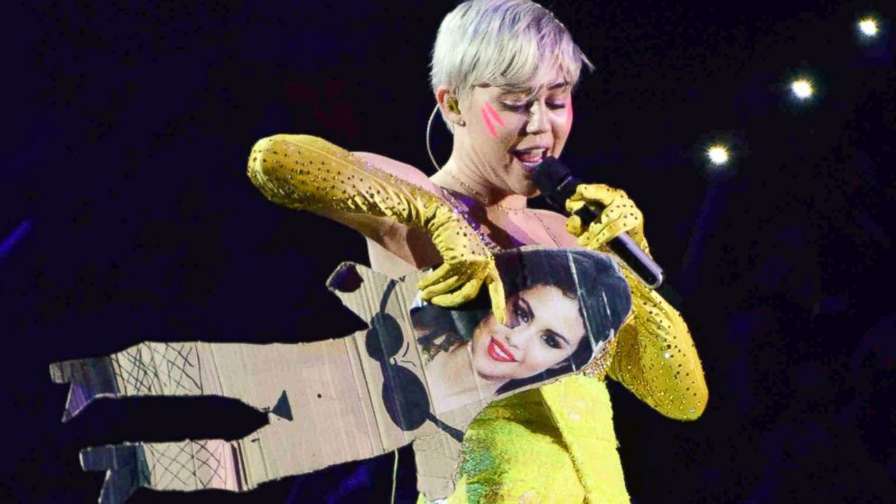 Miley Cyrus Sings Fu While Carrying Cardboard Cutout Of Selena Gomez Abc News