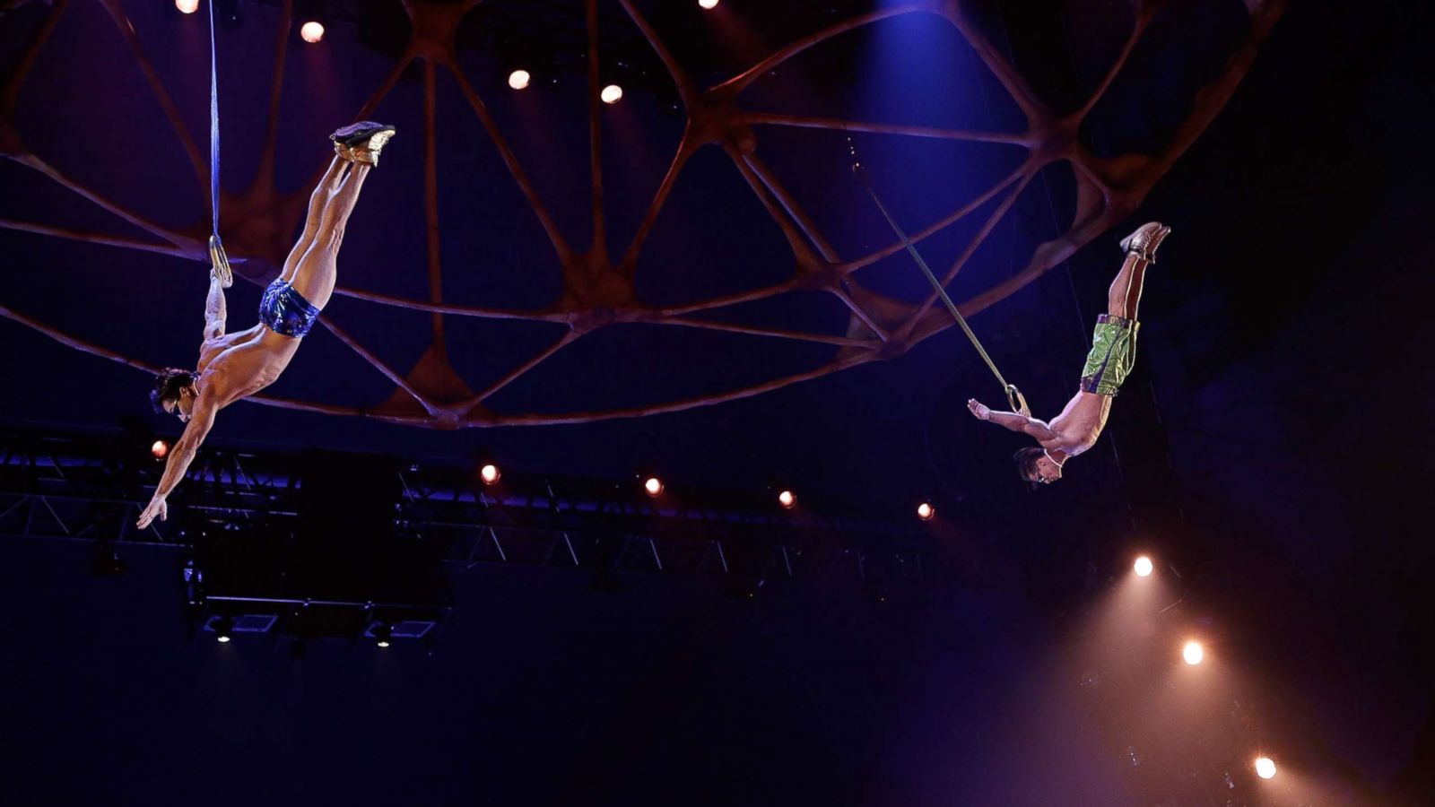 PHOTO: Yann Arnaud and GoelOuisse perform at the "Cirque Du Soleil's Totem" Dress Rehearsal at Citi Field, March 13, 2013 in New York City.