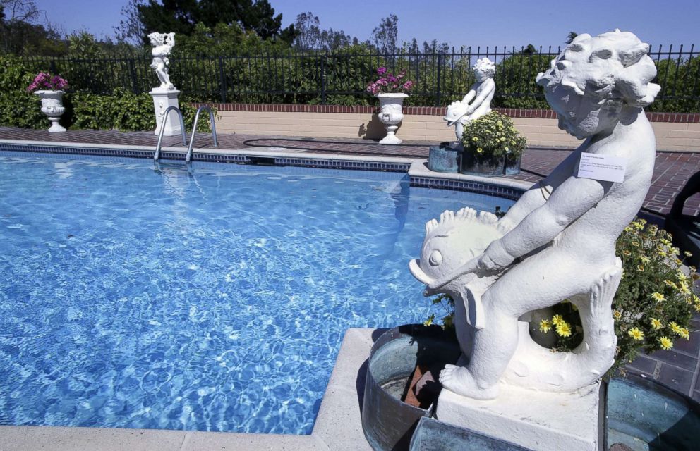 PHOTO: Cast stone figural fountain with four-part copper jardinieres belonging to the late Hungarian-American actress Zsa Zsa Gabor around the pool at the actress' residence in Bel Air, Calif., April 12, 2018.