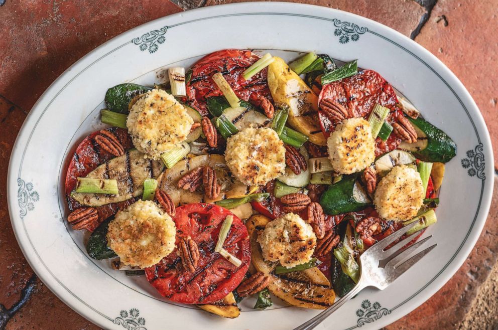 PHOTO: Grilled tomato and zucchini salad with goat cheese.
