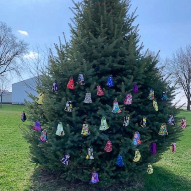 Woman creates 'giving tree' with hundreds of homemade masks for local ...