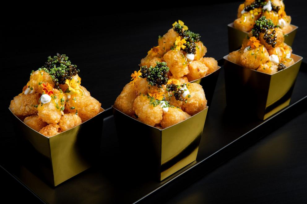 PHOTO: New "bougie" tater tots topped with crème fraîche, caviar and herbs to be served at the 31st Governors Ball Oscars after party. 