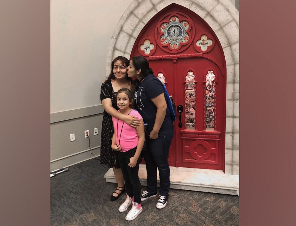 PHOTO: Perla Ortiz with her mom and sister on Ortiz's first day at St. Edward's University.