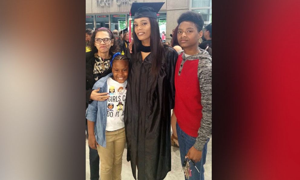 PHOTO: Janese Boston, from Ohio, poses with her mother and two children at her college graduation.