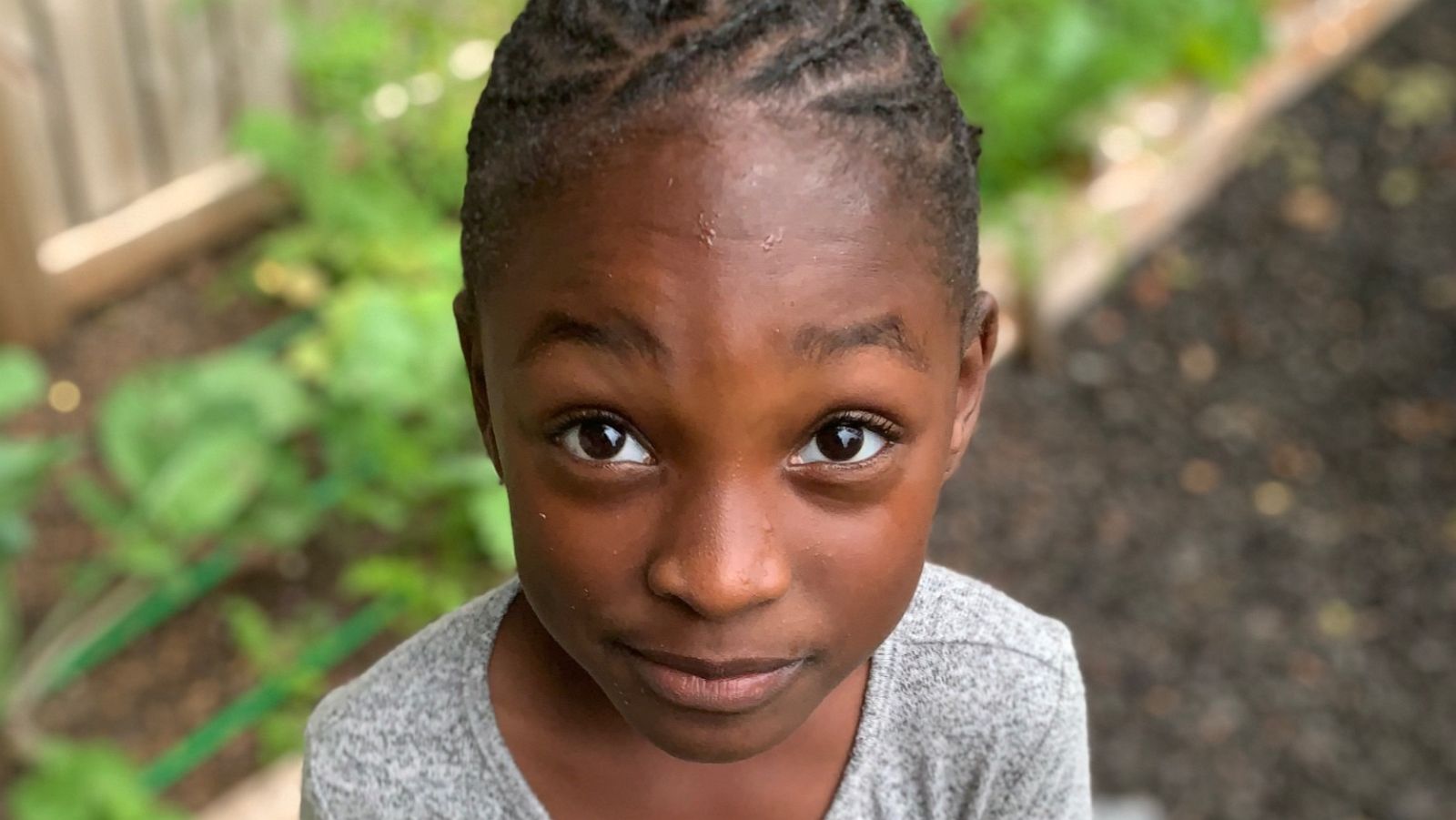 PHOTO: Kendall Rae Johnson, 6, poses with food grown in her own garden. She is the youngest certified farmer in Georgia.