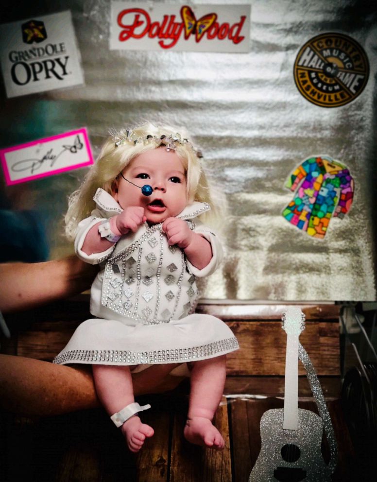 PHOTO: Newborns at HCA Healthcare’s Summerville Medical Center dressed as public figures like Dolly Parton.