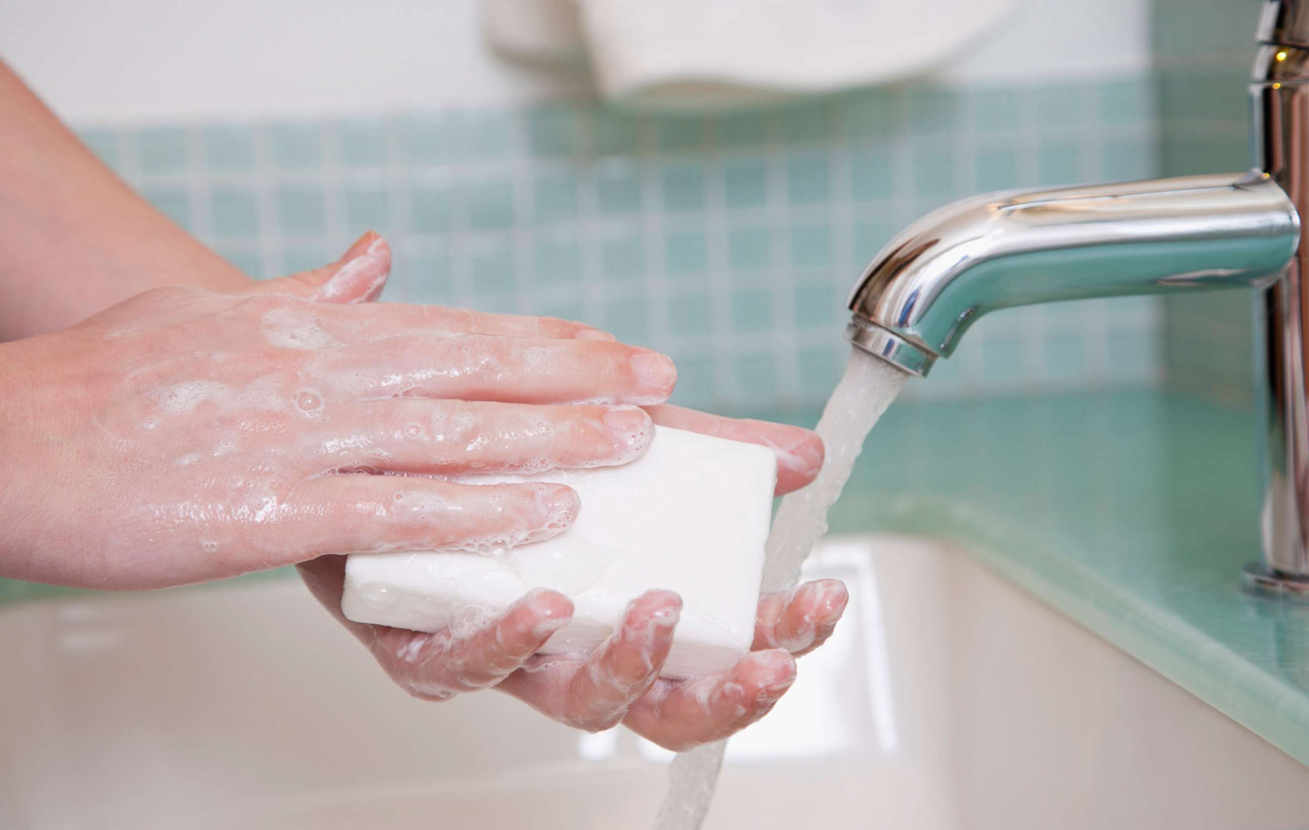 PHOTO: A person washes their hands. 