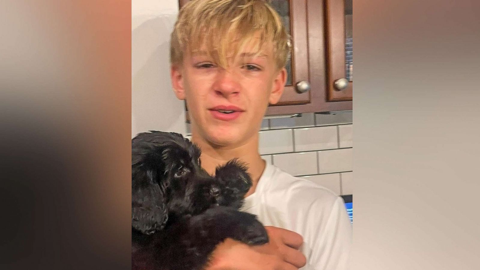 PHOTO: Adam Grimpo couldn't hold back his tears after he was surprised with a puppy for his 12th birthday.