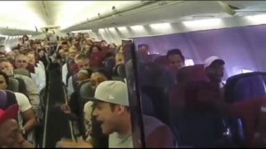 VIDEO: Cast of 'Lion King' Impromptu Airplane Performance