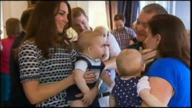 VIDEO: His Royal Highness makes an appearance with other babies in his first official trip abroad.