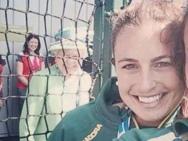 VIDEO: The Australian hockey team was photobombed by her Royal Highness, Queen Elizabeth.