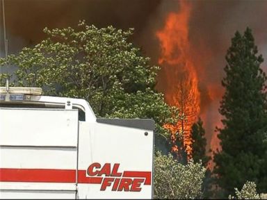 VIDEO: Wildfires rage in California and Oregon while torrential rains flood the Southwest.