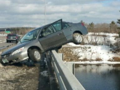 VIDEO: Car Dangles Off Bridge