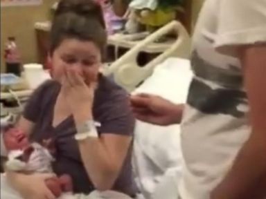 VIDEO: Newborn baby Lynleigh Nicole Miles helped her father propose to her mother with a onesie that read, "Will you marry my Daddy?"