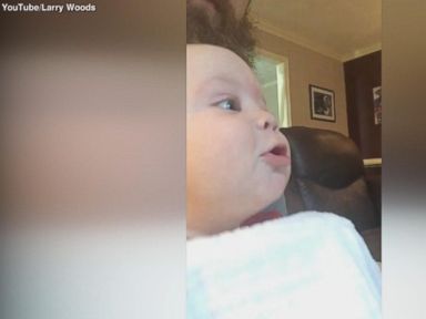 VIDEO: Baby Attempts To Howl With Dogs