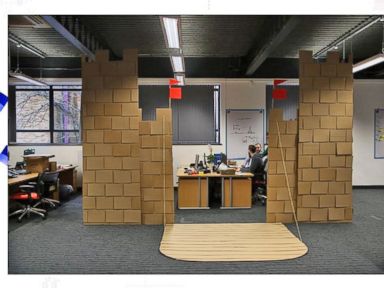 VIDEO: Coworkers Built a 10-Foot-Tall Cardboard Castle in Office