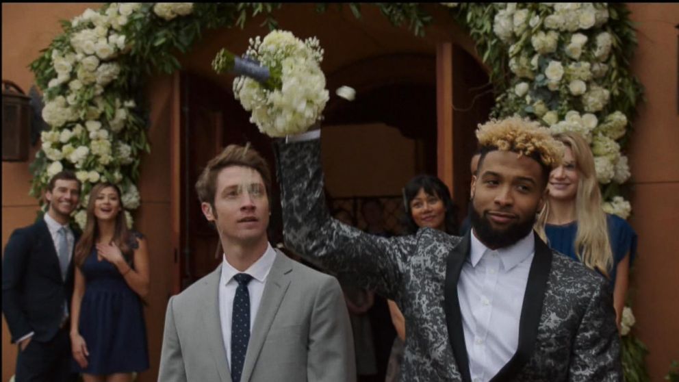 VIDEO: Actress Emily Ratajkowski is a bridesmaid who channels Odell Beckham Jr. to catch the wedding bouquet.