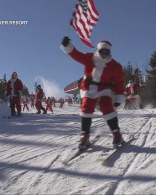 VIDEO: Bearded men in red suits ditched their sleighs to raise money for charity at a ski resort in Maine.