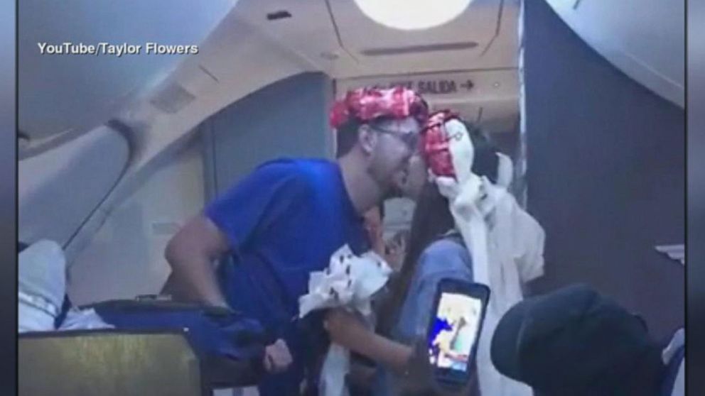 VIDEO: Newlyweds get mid-air wedding ceremony on flight to honeymoon