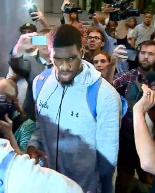 VIDEO: UCLA players accused of shoplifting return to US