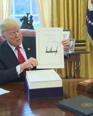 VIDEO: Trump signs $1.5 trillion tax bill