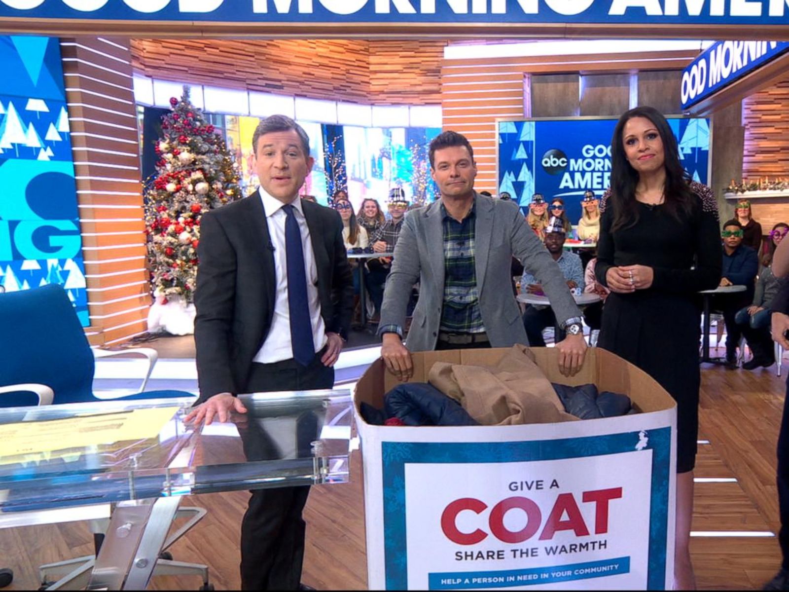 Ryan Seacrest donates a coat to the Burlington Coat Drive live on 'GMA' 