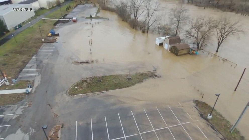 Video Rising flood waters take over roads, neighborhoods - ABC News