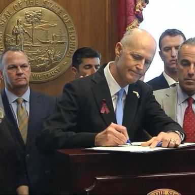 VIDEO: Florida governor signs new gun law 3 weeks after horrific school shooting