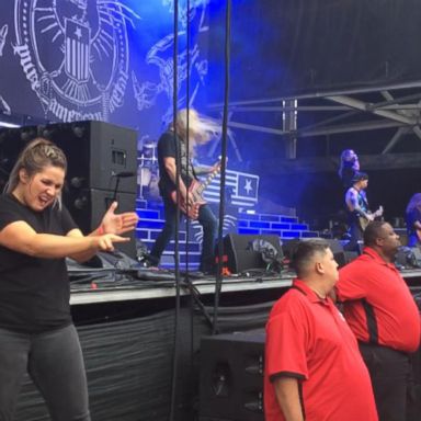 VIDEO: Sign language interpreter rocks out at heavy metal concert 