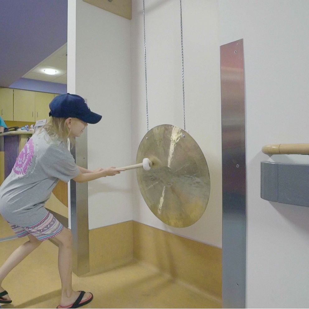 8-year-old patient marks end of radiation with an empowering gong ...