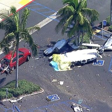 VIDEO: Private plane nosedives into parking lot