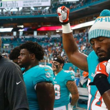 VIDEO: NFL players take a knee, raise fists during national anthem