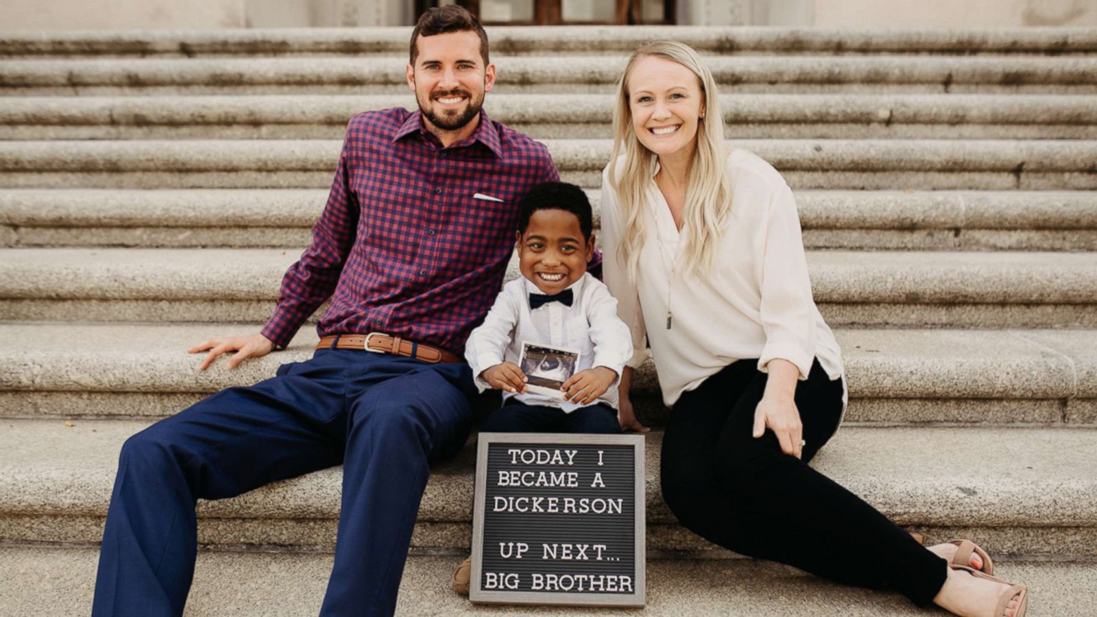 VIDEO: Boy reveals he's going to be a big brother on the same day he's adopted