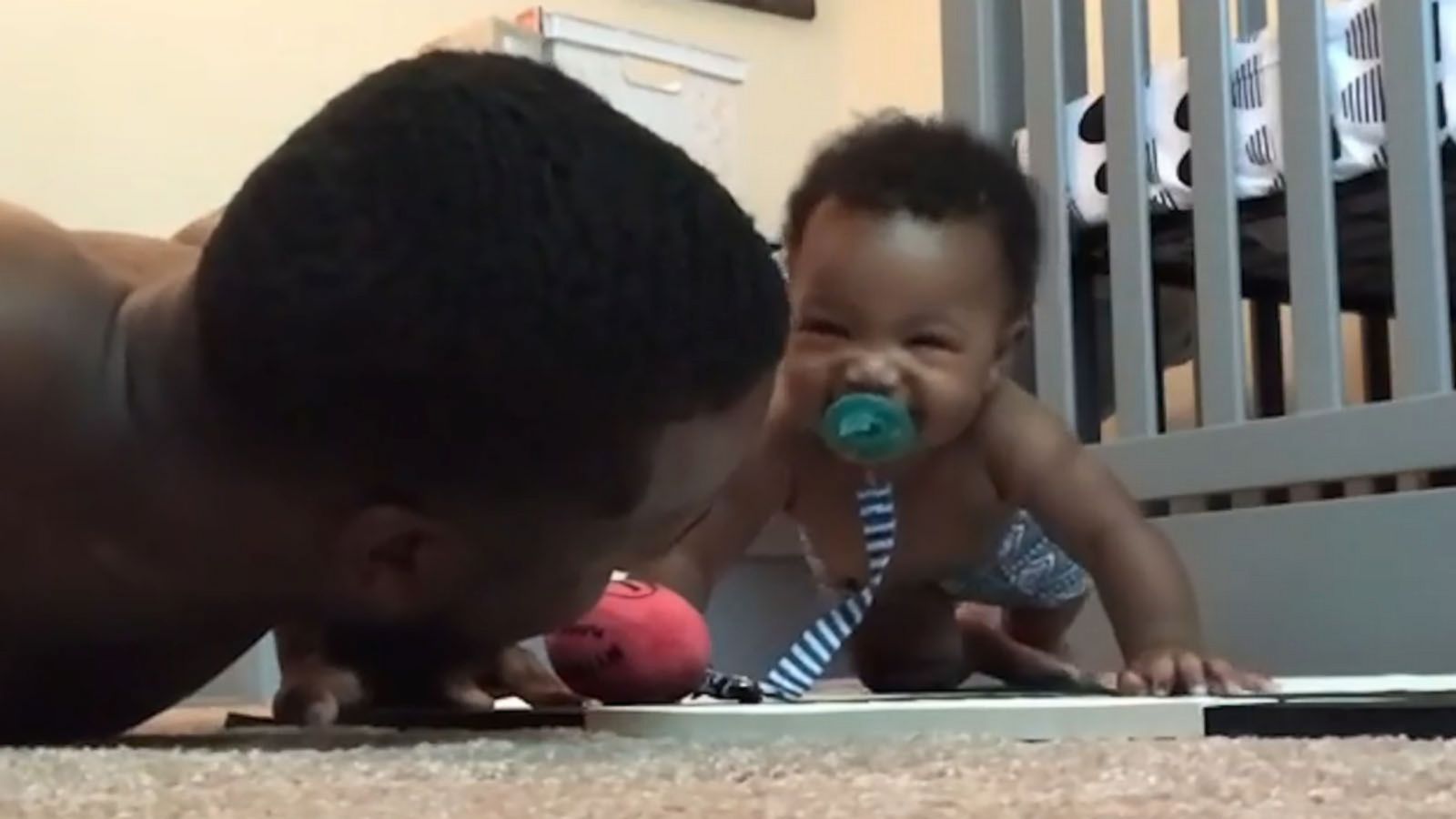 VIDEO: Adorable baby does push-ups with his dad