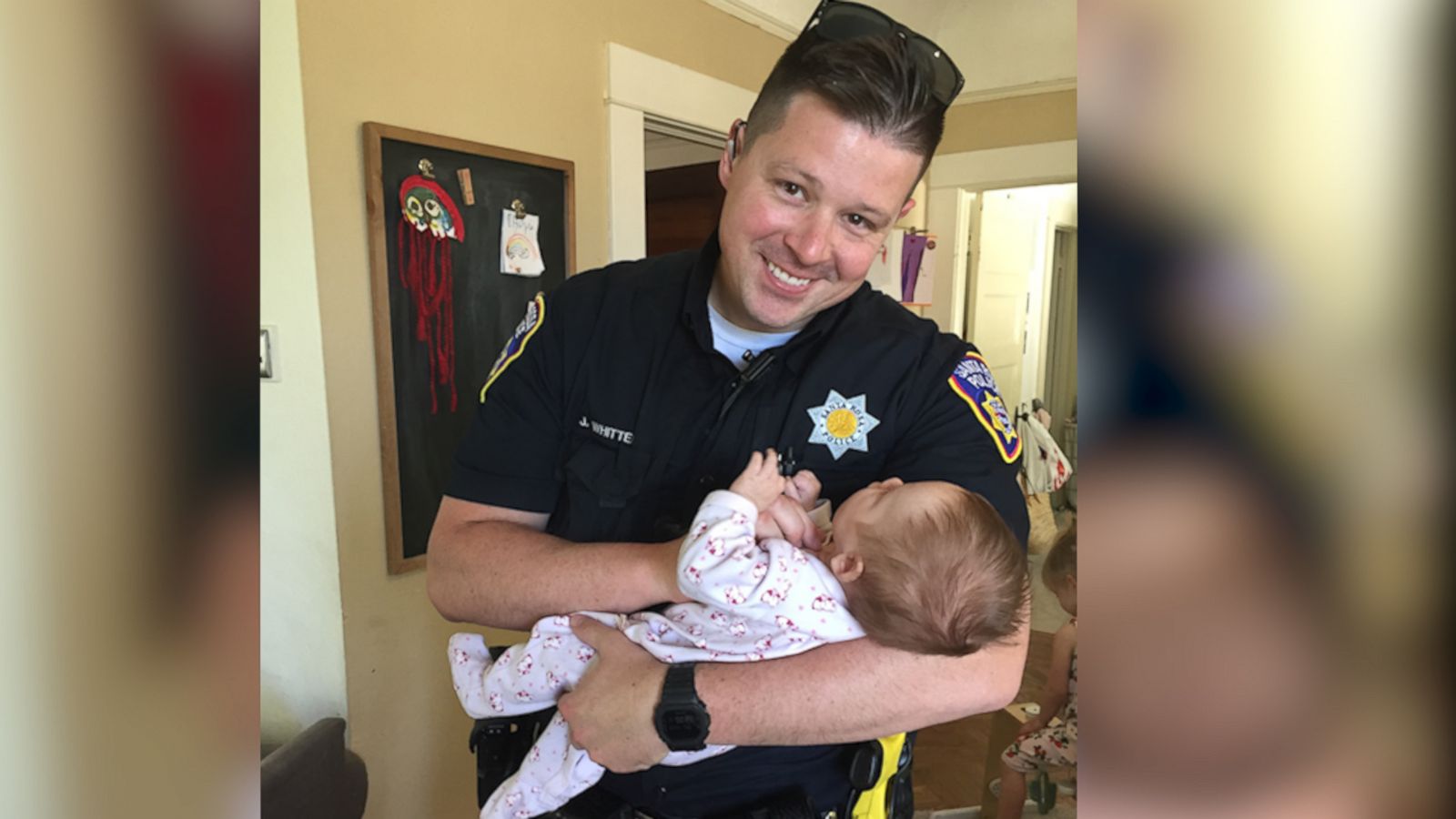 VIDEO: Cop adopts baby from homeless woman