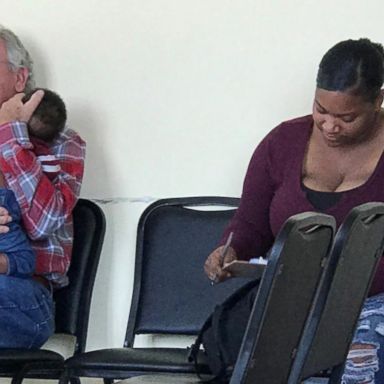 VIDEO: Grandfather cradles stranger's baby in waiting room 