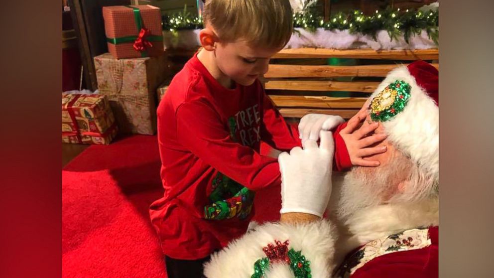 Image result for Santa captures magic of Christmas for blind boy with autism in Texas