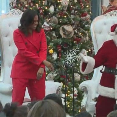 VIDEO: Michelle Obama dances in surprise visit with Santa