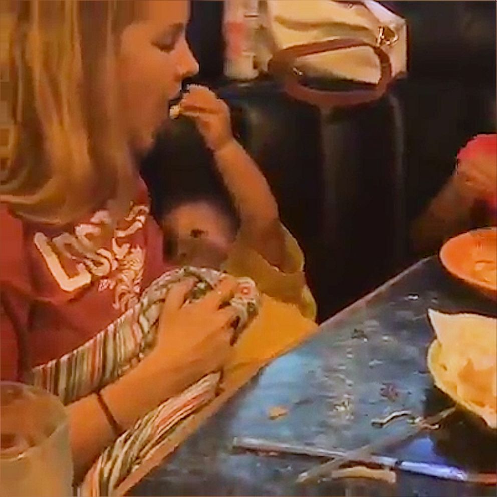VIDEO: Baby gives mom fries while he breastfeeds because he knows how this works