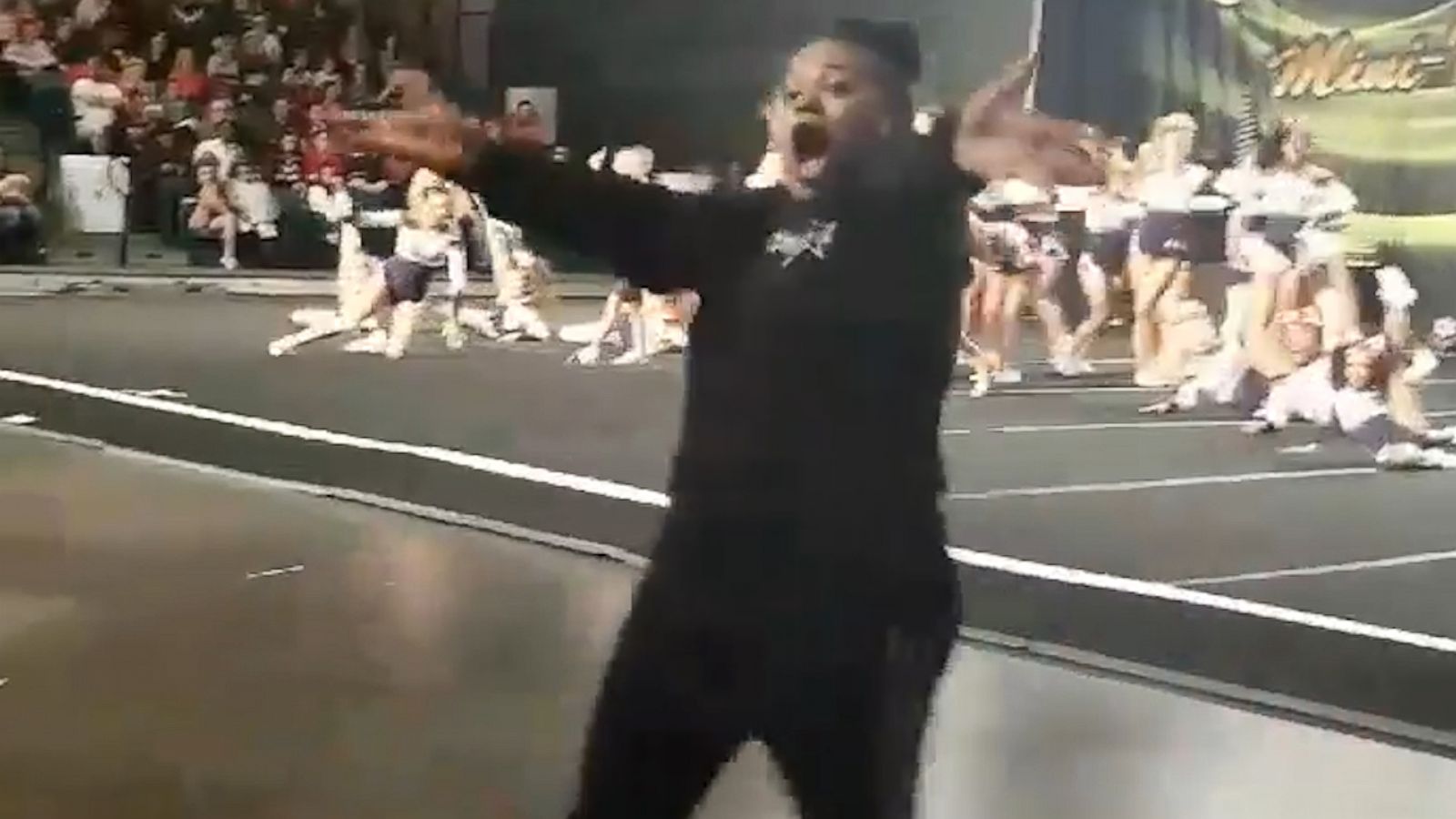 VIDEO: Cheerleading coaches go wild on sidelines as squad nails their routine