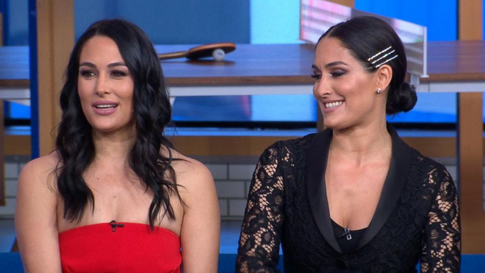 Brie and Nikki Bella attend FIT Fashion Show in New York City