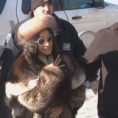 VIDEO: The 26-year-old rapper was decked out in all fur, replete with a fur hat, as she strutted up the steps of Queens Criminal Court.