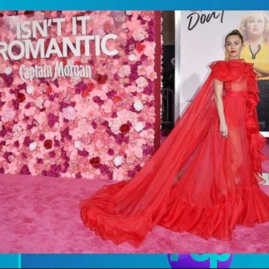 VIDEO: Miley Cyrus fills in for husband Liam Hemsworth at 'Isn't It Romantic' premiere